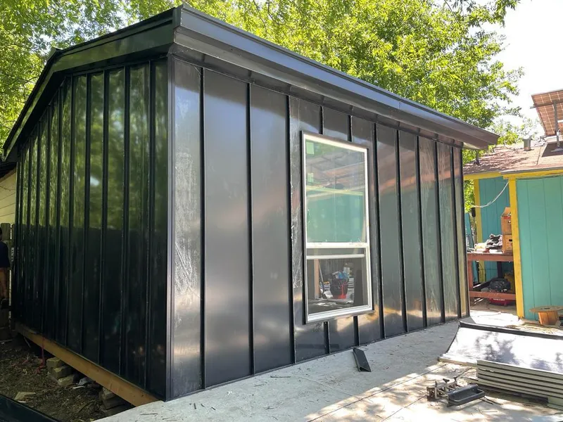 Black standing seam metal wall panels for Roof Inspection in Cuero