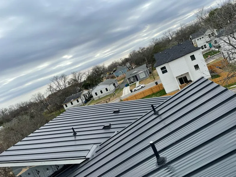 Standing seam metal roof panels with vents for Skylight Repair in Cuero